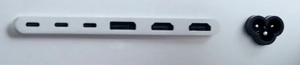 Close-up of the row of connectors on the back of the Kuycon P27D: three USB-C ports, a DisplayPort, two HDMI ports, then the power socket